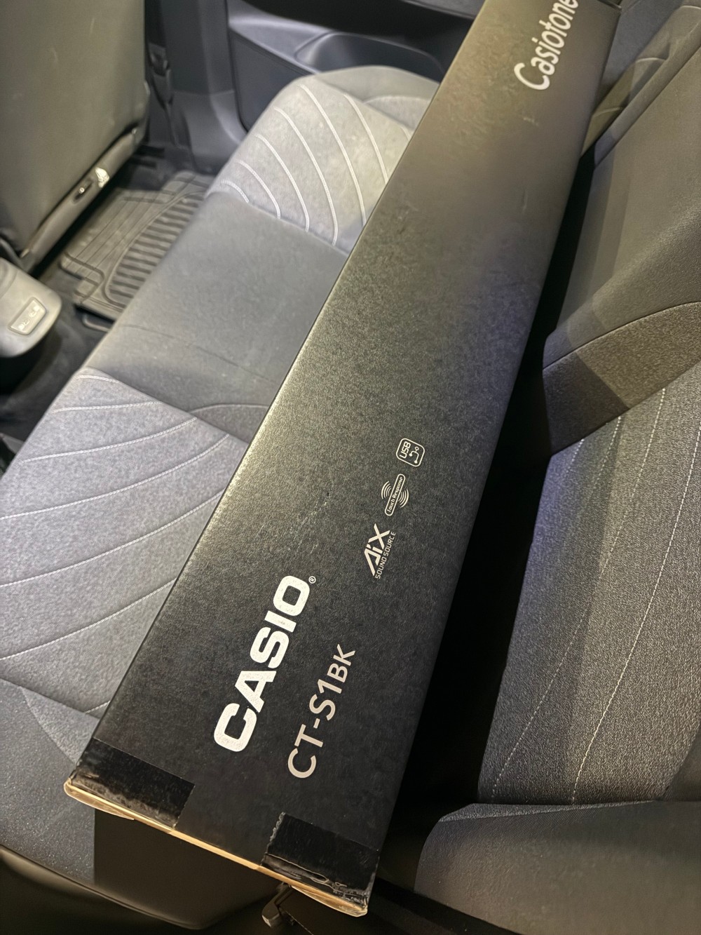 My Casio CT-S1 in my car&rsquo;s back seat